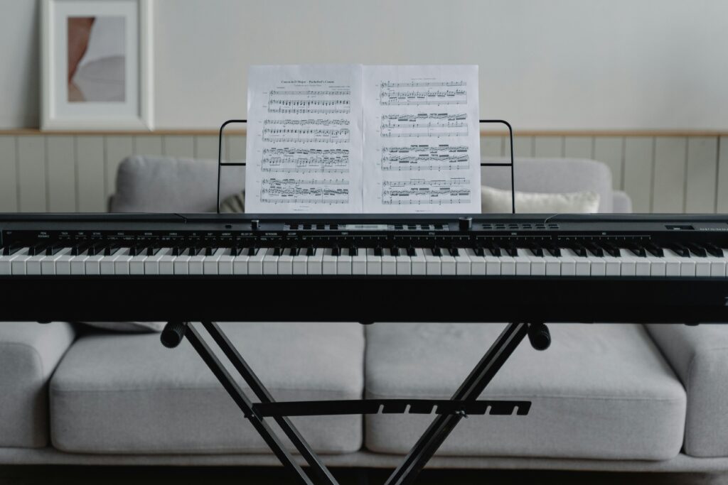 A digital piano with sheet music in an elegant living room setting, capturing a musical atmosphere.